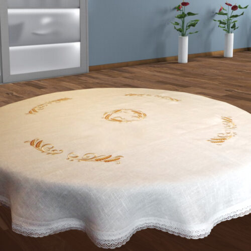 Tikitud viljapeadega ümmargune laualina